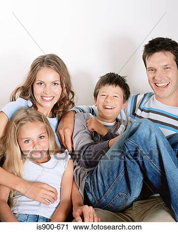 Stock Image - Family sitting together. Fotosearch