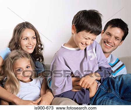 Father tickling son View Large Photo Image Stock Image - Father tickling son. Fotosearch