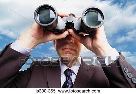Stock Photography - Man using binoculars. Fotosearch