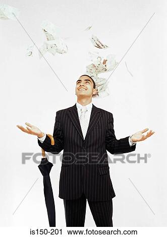 Money falling on businessman View Large Photo Image Stock Image - Money falling on businessman. Fotosearch