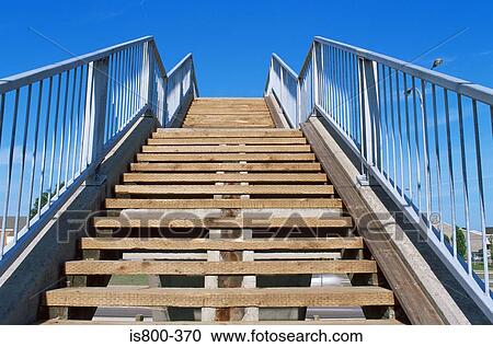 Steps over a road View Large Photo Image Stock Image - Steps over a road. Fotosearch