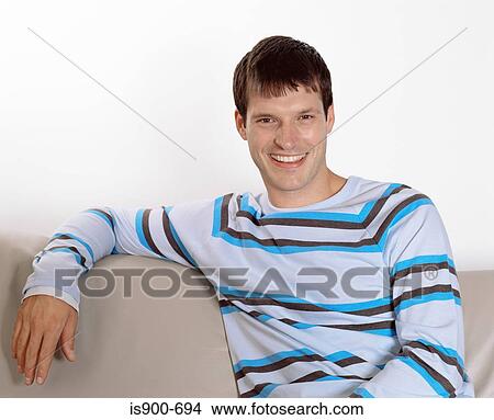 Young man smiling View Large Photo Image Picture - Young man smiling. Fotosearch
