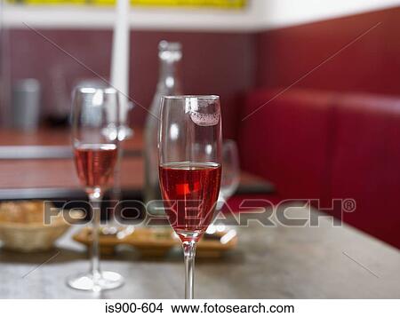 Picture - Close up of champagne glass with lipstick mark. Fotosearch