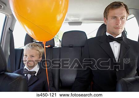 Man and boy in a car wearing dinner jackets View Large Photo Image Stock Image - Man and boy in a car wearing dinner jackets. Fotosearch