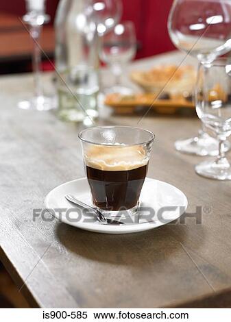 Stock Photography - Still life of espresso coffee on table. Fotosearch
