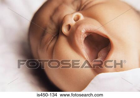 Picture - Baby yawning. Fotosearch