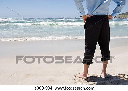 Businessman at the beach View Large Photo Image Picture - Businessman at the beach. Fotosearch