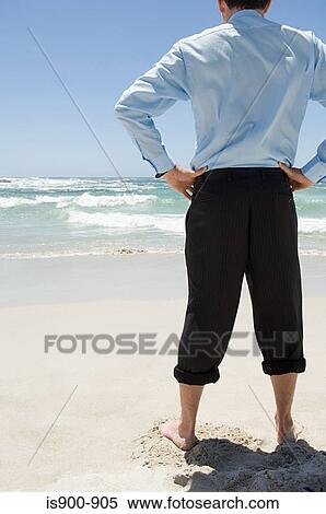 Businessman at the beach View Large Photo Image Stock Photography - Businessman at the beach. Fotosearch