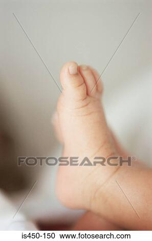 Stock Image - Foot of a baby. Fotosearch