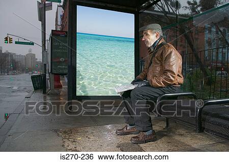 Man daydreaming in bus shelter View Large Photo Image Stock Photograph - Man daydreaming in bus shelter. Fotosearch