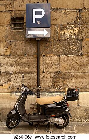 Moped on a paris street View Large Photo Image Stock Photo - Moped on a paris street. Fotosearch