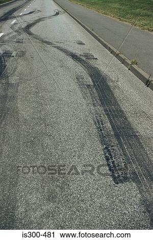 Tyre tracks on a road View Large Photo Image Stock Image - Tyre tracks on a road. Fotosearch