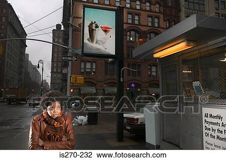 Woman on street with billboard View Large Photo Image Stock Image - Woman on street with billboard. Fotosearch