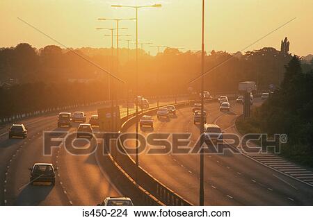 Picture - A highway at sunset. Fotosearch