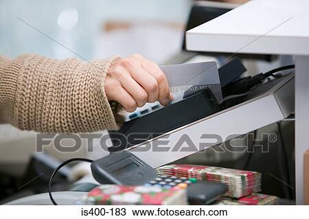 Swiping a credit card View Large Photo Image Stock Image - Swiping a credit card. Fotosearch