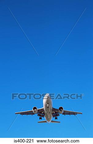 Aeroplane in the sky View Large Photo Image Stock Image - Aeroplane in the sky. Fotosearch