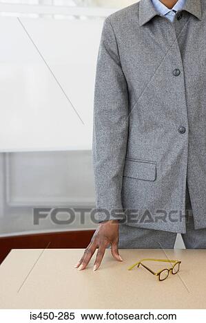 Businesswoman with glasses View Large Photo Image Stock Photography - Businesswoman with glasses. Fotosearch