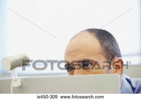 Man looking at webcam View Large Photo Image Stock Photo - Man looking at webcam. Fotosearch