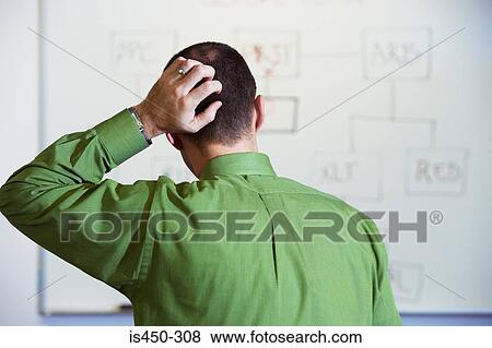 Stock Photo - Man scratching his head. Fotosearch