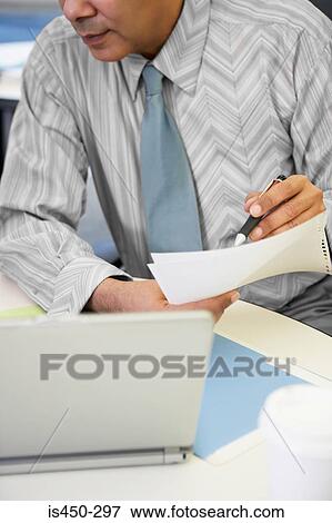 Stock Photo - Man working. Fotosearch