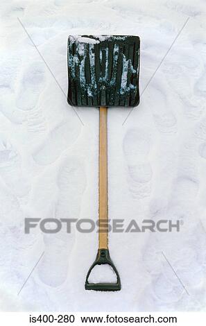 Shovel in the snow View Large Photo Image Stock Image - Shovel in the snow. Fotosearch