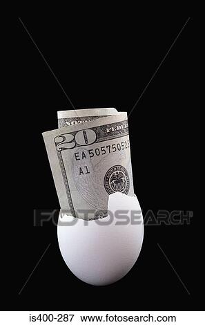 Twenty dollars in an egg View Large Photo Image Stock Photo - Twenty dollars in an egg. Fotosearch