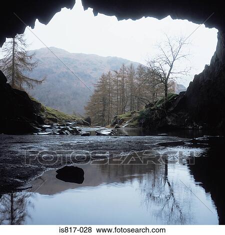 View from a cave View Large Photo Image Stock Photo - View from a cave. Fotosearch