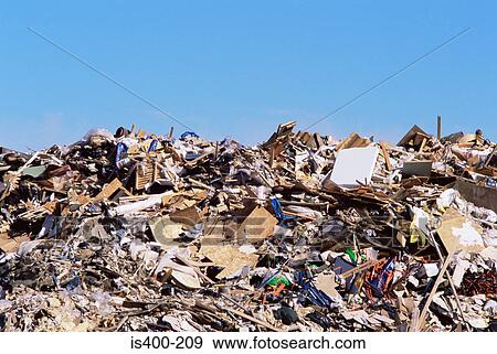 Waste at a rubbish dump View Large Photo Image Stock Photo - Waste at a rubbish dump. Fotosearch