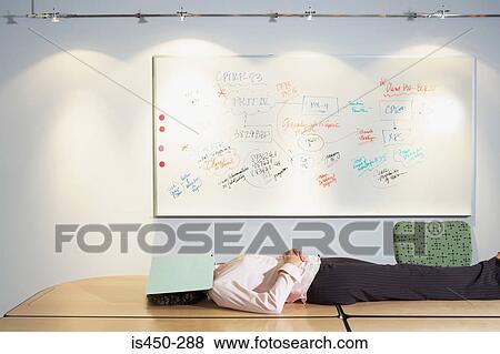 Woman sleeping in office View Large Photo Image Stock Photo - Woman sleeping in office. Fotosearch