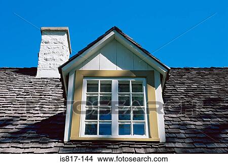 Window and chimney on roof of house View Large Photo Image Picture - Window and chimney on roof of house. Fotosearch