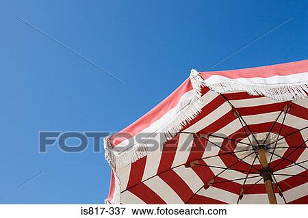 Stock Photo - Parasol and blue sky. Fotosearch
