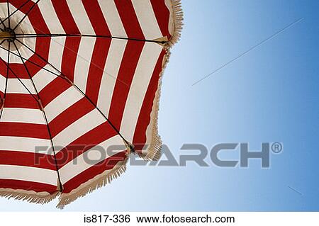 Parasol and blue sky View Large Photo Image Stock Photograph - Parasol and blue sky. Fotosearch