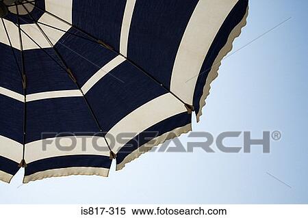 Parasol and blue sky View Large Photo Image Stock Photography - Parasol and blue sky. Fotosearch