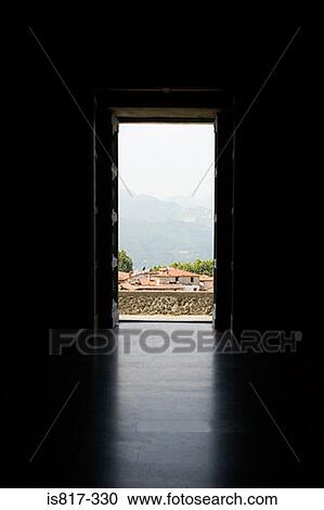Stock Image - View of barga through a doorway. Fotosearch