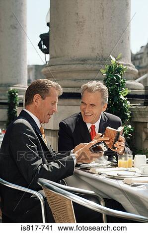 Businessmen at breakfast View Large Photo Image Stock Image - Businessmen at breakfast. Fotosearch