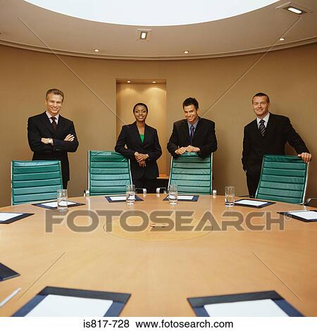 Businesspeople in conference room View Large Photo Image Stock Photo - Businesspeople in conference room. Fotosearch