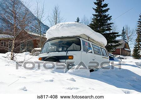 Camper van in the snow View Large Photo Image Stock Photo - Camper van in the snow. Fotosearch