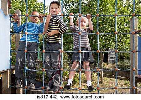 Children on a rope climbing net View Large Photo Image Stock Image - Children on a rope climbing net. Fotosearch