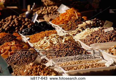 Dried fruit and nuts on market stall View Large Photo Image Stock Image - Dried fruit and nuts on market stall. Fotosearch