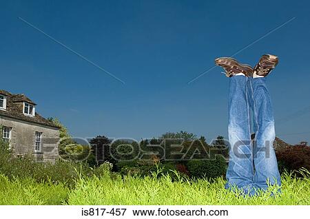 Stock Photo - Legs of mannequin in garden. Fotosearch