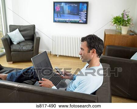 Man working at home View Large Photo Image Stock Image - Man working at home. Fotosearch