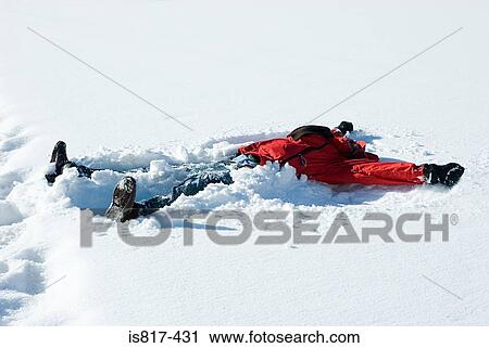 Person making a snow angel View Large Photo Image Stock Image - Person making a snow angel. Fotosearch