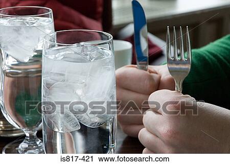 Person with knife and fork View Large Photo Image Stock Image - Person with knife and fork. Fotosearch