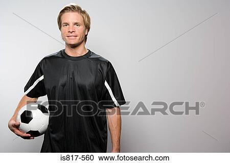 Stock Image - Portrait of a footballer. Fotosearch