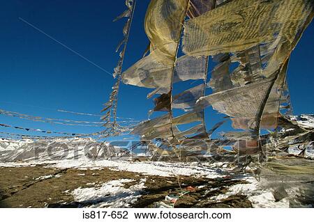 Stock Image - Prayer flags on mountain. Fotosearch
