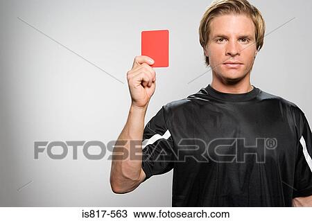 Referee holding red card View Large Photo Image Stock Image - Referee holding red card. Fotosearch