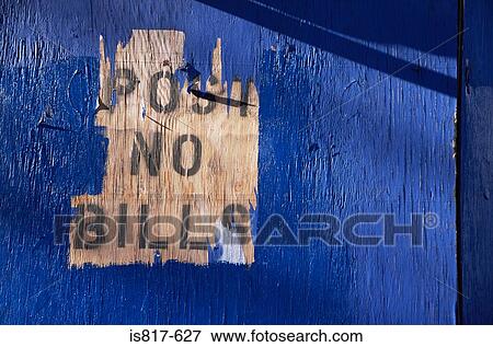 Stock Photo - Stencilled sign on a wall. Fotosearch