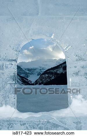 Stock Image - View through carved ice at lake louise. Fotosearch