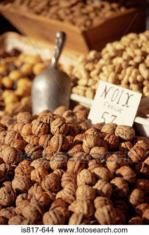 Picture - Walnuts on a market stall. Fotosearch
