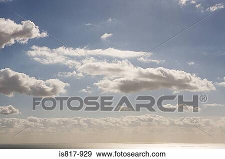 Clouds above the sea View Large Photo Image Stock Photo - Clouds above the sea. Fotosearch